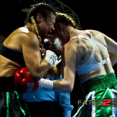 Heather Hardy with a fierce bodyshot sealing her UD against Ivana Coleman, Credit: Heather Hardy